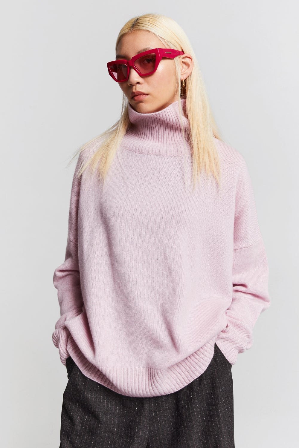 Pink oversized hotsell roll neck jumper