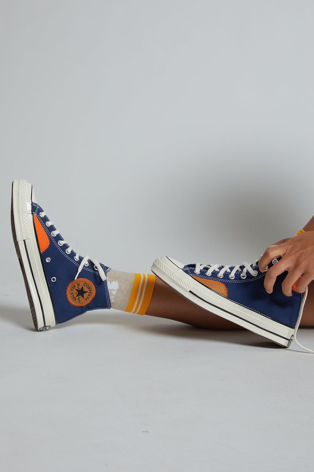 navy and orange converse