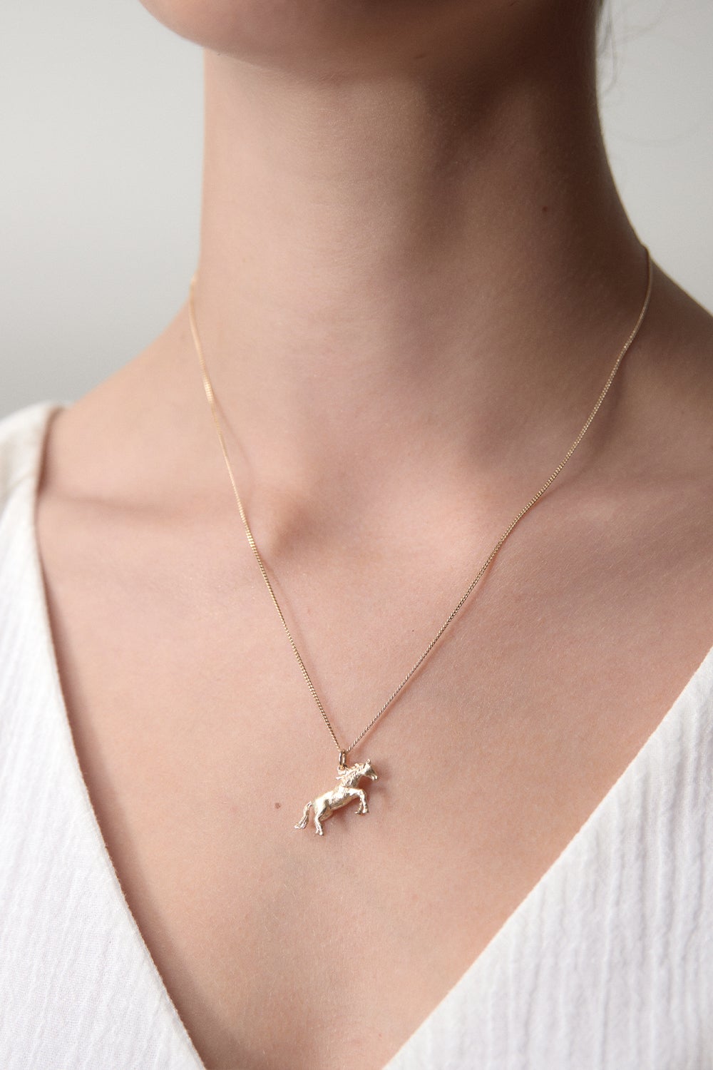 karen walker carousel horse necklace